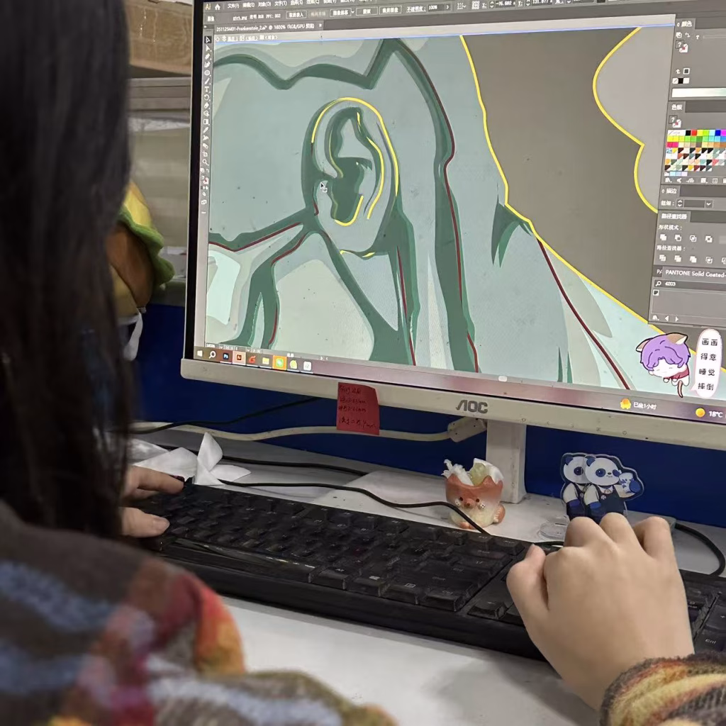 Artist sketching a design to avoid custom pin mistakes