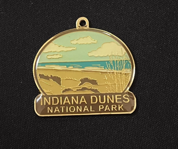 This pin was made in 2022, and the epoxy on its surface has yellowed.