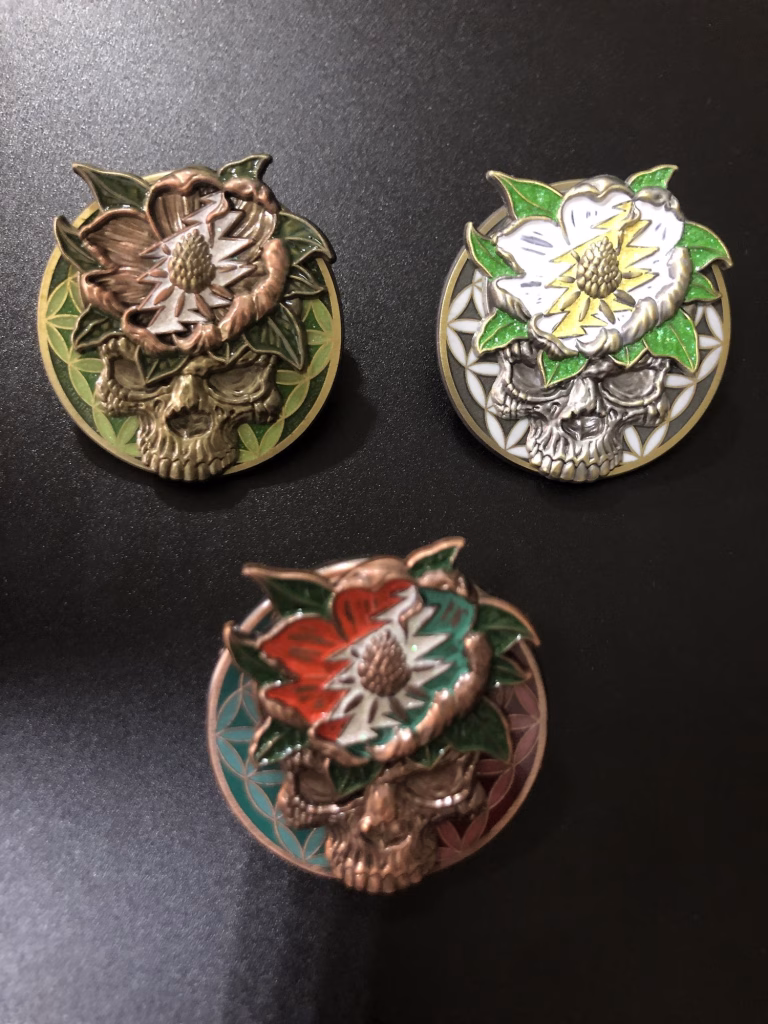 Various metal plating styles for custom lapel pins shown in one image