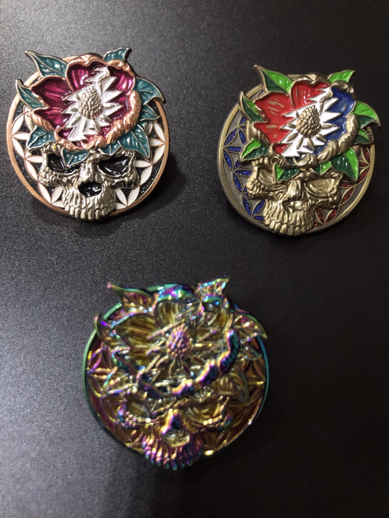 Various metal plating styles for custom lapel pins shown in one image